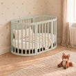 BusyKids MIRACLE 7-in-1 mitwachsendes Babybett mit Matratze